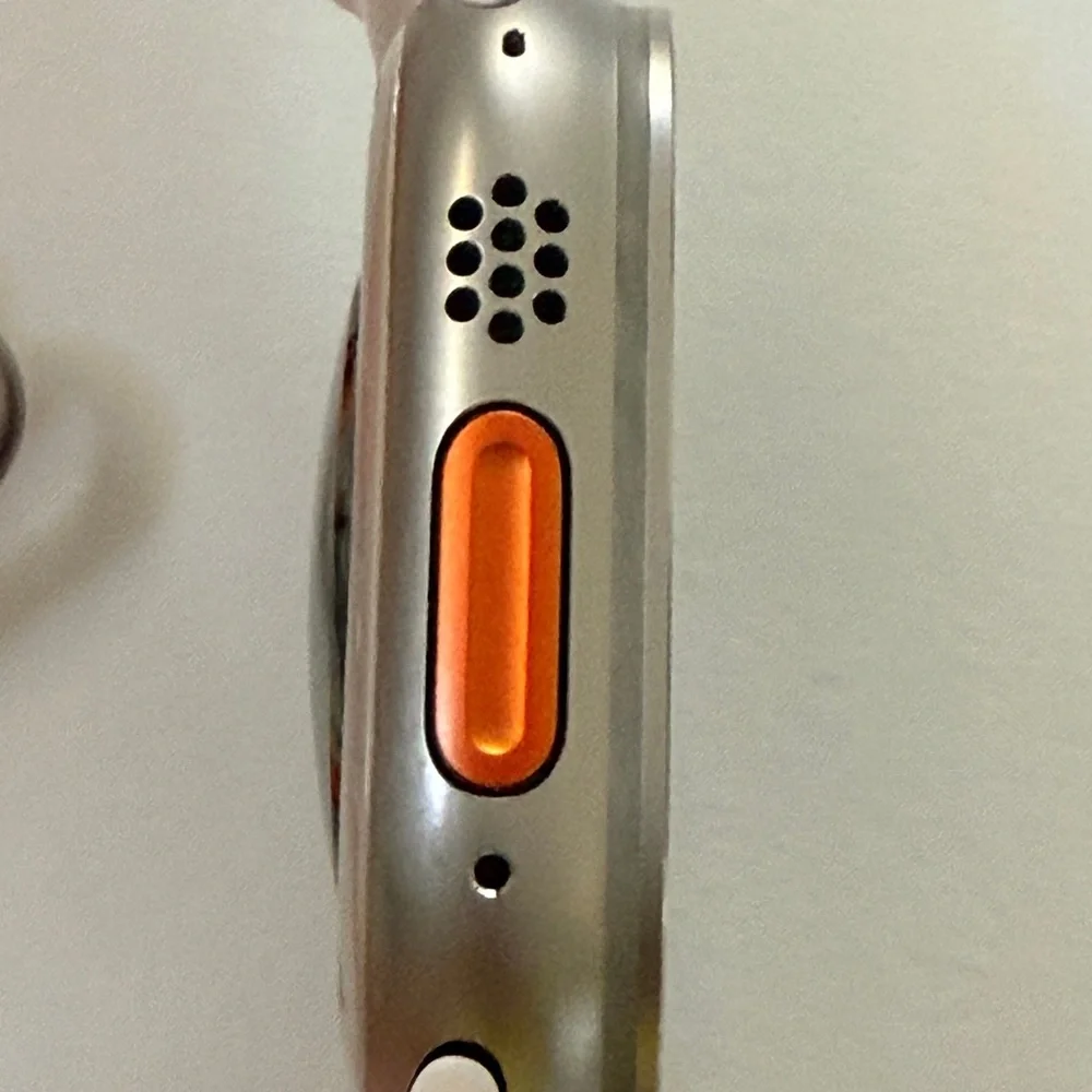 Apple Watch Ultra 1st Gen Smartwatch with White, Orange, and Yellow Bands